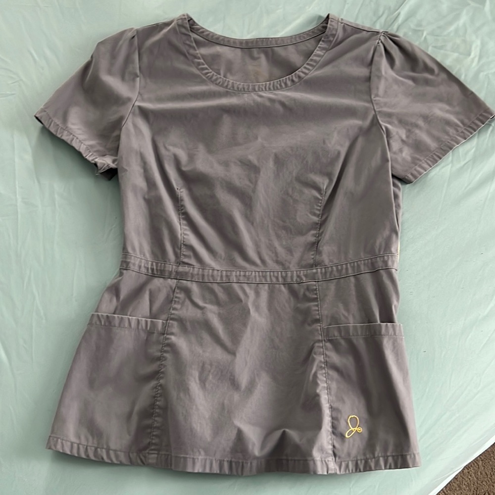 Jaanuu peplum scrub top